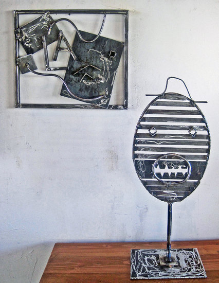 a mask and wall piece